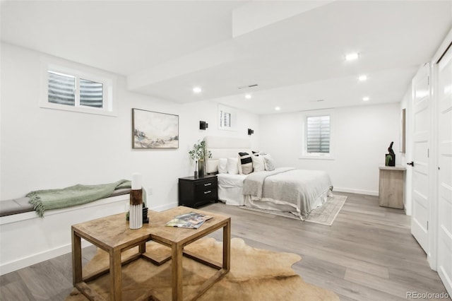 5886 S Logan St, Centennial, CO 80121 - bedroom featuring light wood-style flooring and recessed lighting