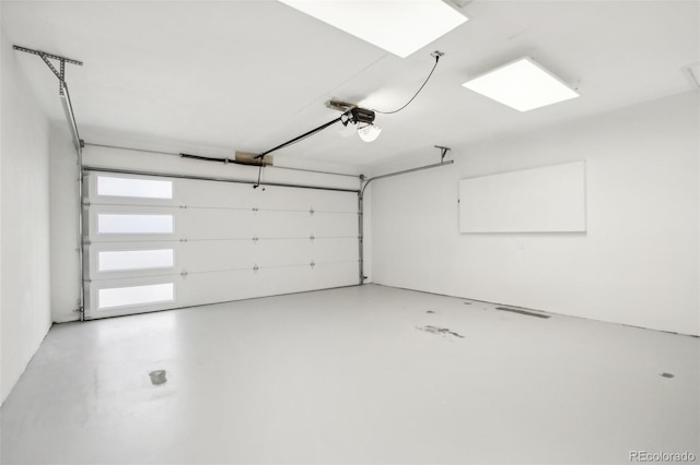 5886 S Logan St, Centennial, CO 80121 - garage featuring a garage door opener