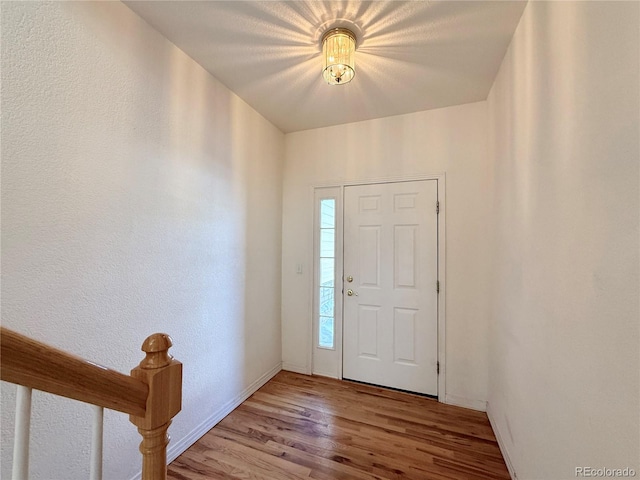 entrance foyer with hardwood / wood-style floors