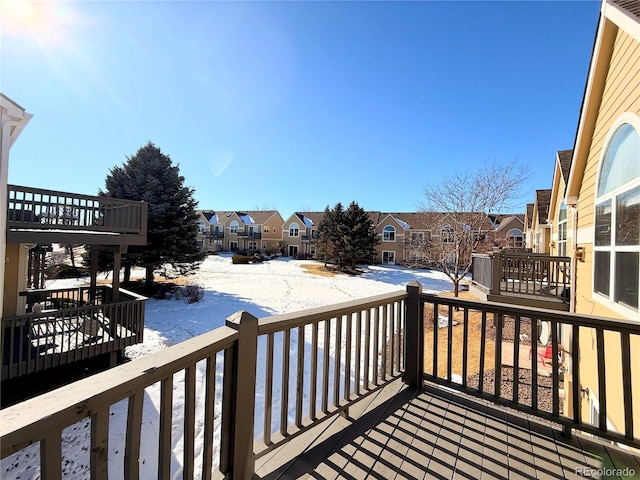 view of snow covered deck