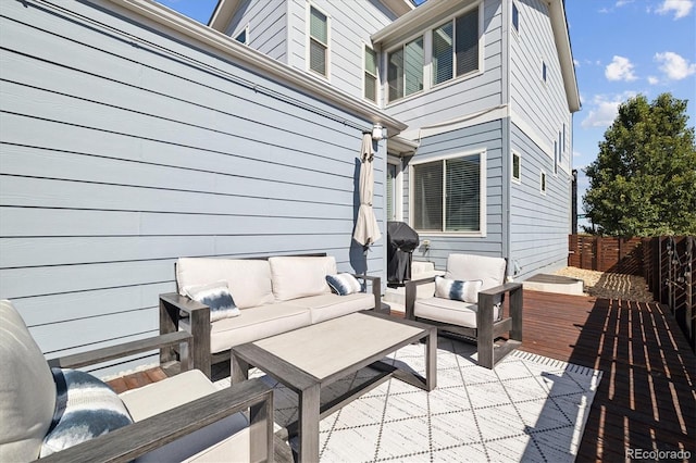 exterior space featuring grilling area, an outdoor hangout area, and fence