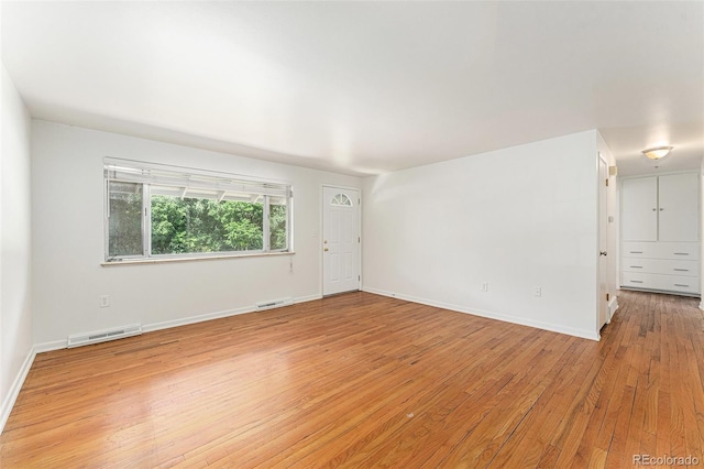 2017 Jackson St, Golden, CO 80401 - empty room with light wood-style floors and baseboards