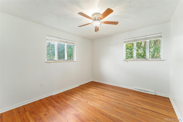 2017 Jackson St, Golden, CO 80401 - spare room featuring light wood-style floors and ceiling fan