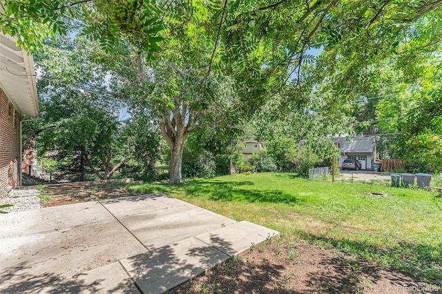 2017 Jackson St, Golden, CO 80401 - view of yard with a patio and view of wooded area