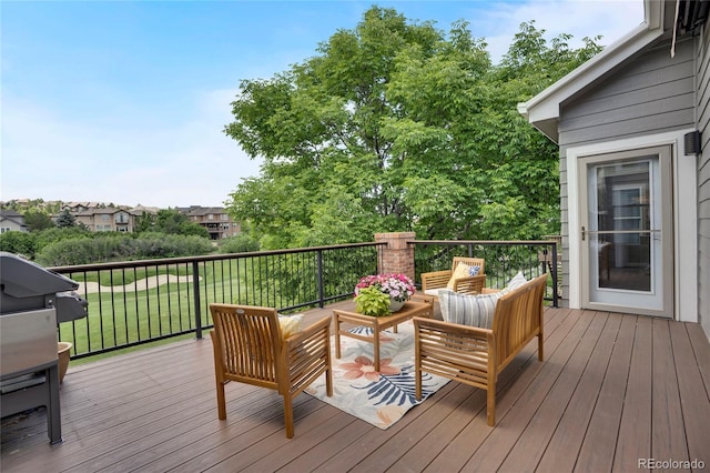 1001 Deer Clover Way, Castle Pines, CO 80108 - wooden deck featuring an outdoor living space and a lawn