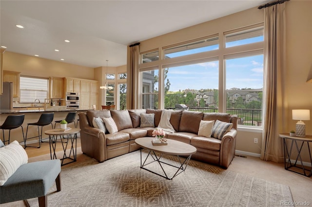 1001 Deer Clover Way, Castle Pines, CO 80108 - living area with healthy amount of natural light and recessed lighting