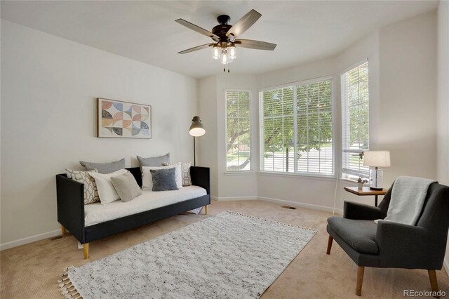1001 Deer Clover Way, Castle Pines, CO 80108 - living area with carpet floors and a ceiling fan