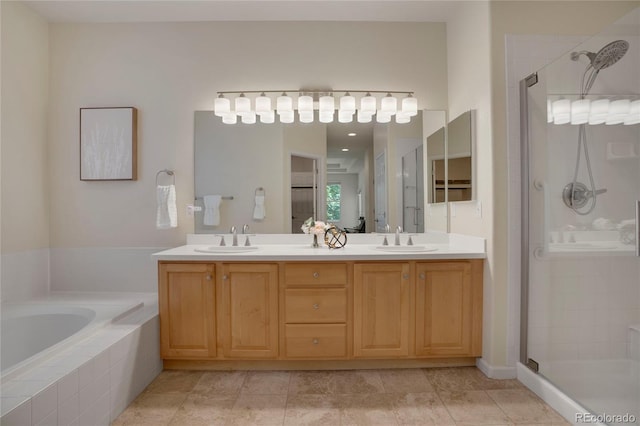 1001 Deer Clover Way, Castle Pines, CO 80108 - full bathroom featuring a stall shower, double vanity, and a bath