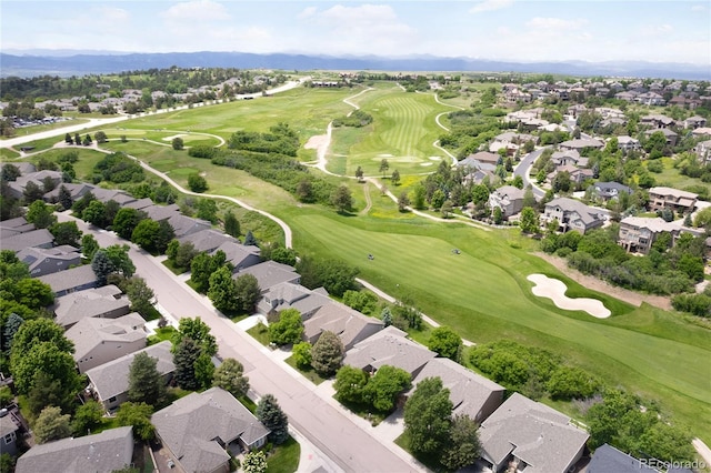 1001 Deer Clover Way, Castle Pines, CO 80108 - aerial perspective of suburban area with a golf course and a mountain backdrop