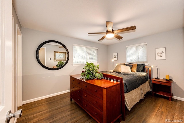 bedroom with baseboards, a ceiling fan, and dark wood-style floors