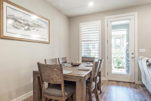 1976 Canyonpoint Ln, Castle Pines, CO 80108 - dining space with hardwood / wood-style floors and baseboards