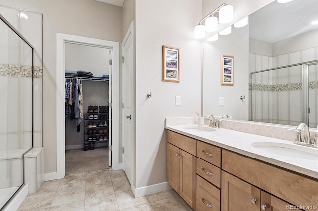 1976 Canyonpoint Ln, Castle Pines, CO 80108 - full bath with a stall shower, double vanity, and a walk in closet