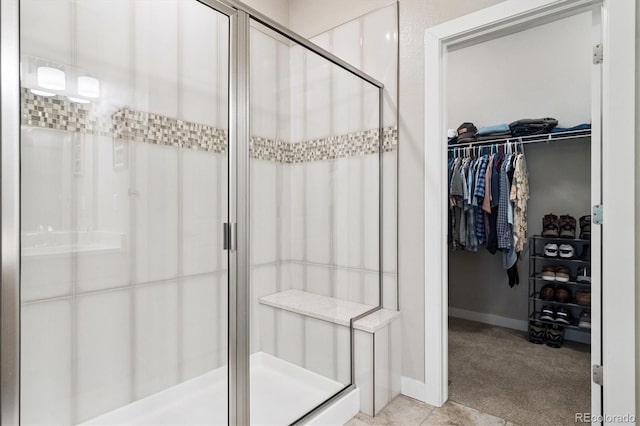 1976 Canyonpoint Ln, Castle Pines, CO 80108 - bathroom with a stall shower and a spacious closet