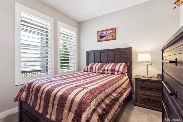 1976 Canyonpoint Ln, Castle Pines, CO 80108 - carpeted bedroom with baseboards