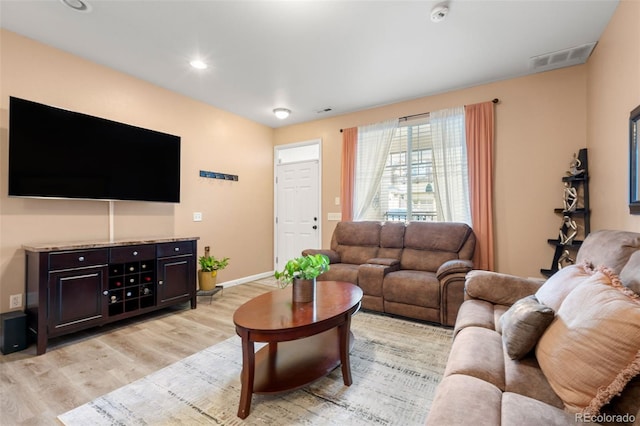 living room featuring light wood-type flooring