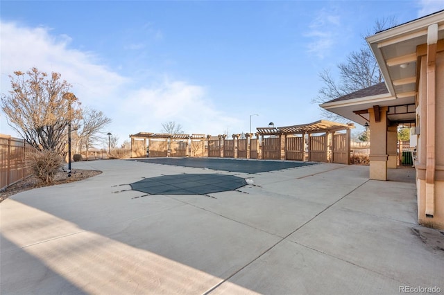 view of patio featuring a pergola