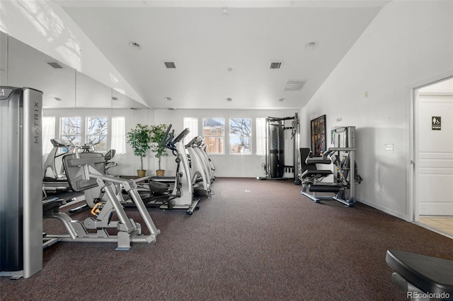 gym with vaulted ceiling