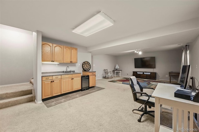 home office featuring beverage cooler, wet bar, a sink, and light colored carpet