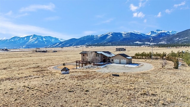 mountain view featuring a rural view