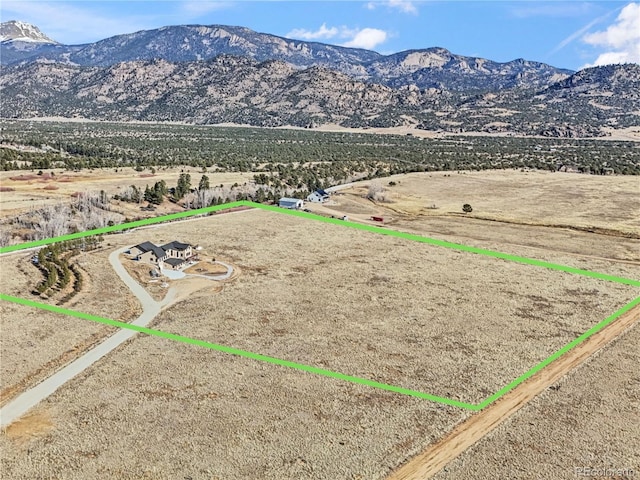 mountain view featuring a rural view