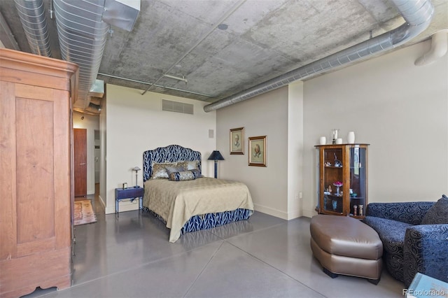 1610 Little Raven St Unit 502, Denver, CO 80202 - bedroom with concrete floors and baseboards