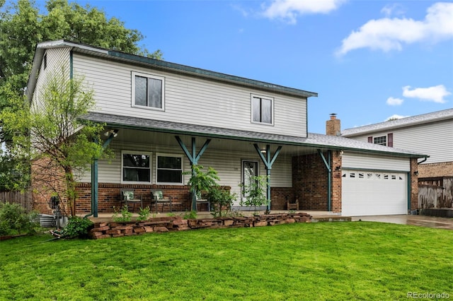 4550 E 121st Pl, Thornton, CO 80241 - view of front of home featuring covered porch, a front lawn, and brick siding