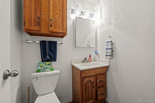 4550 E 121st Pl, Thornton, CO 80241 - half bathroom featuring vanity and toilet