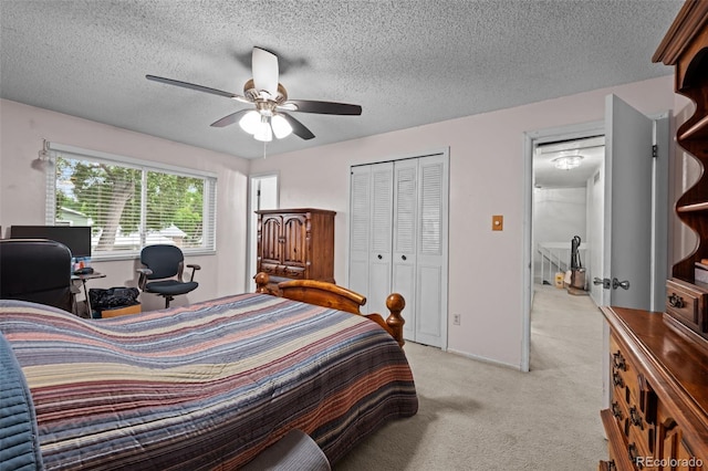 4550 E 121st Pl, Thornton, CO 80241 - bedroom with light carpet, a textured ceiling, ceiling fan, and a closet