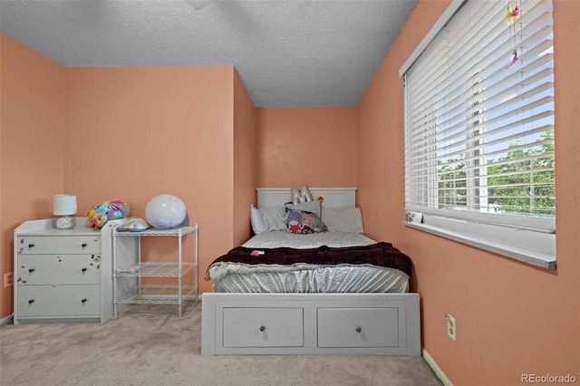 4550 E 121st Pl, Thornton, CO 80241 - carpeted bedroom with a textured ceiling