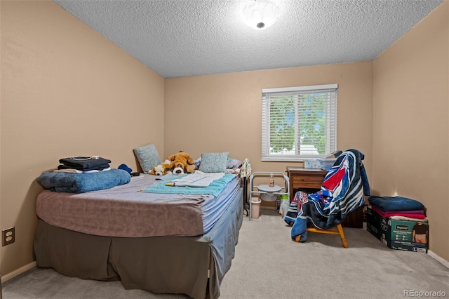 4550 E 121st Pl, Thornton, CO 80241 - carpeted bedroom with a textured ceiling and baseboards
