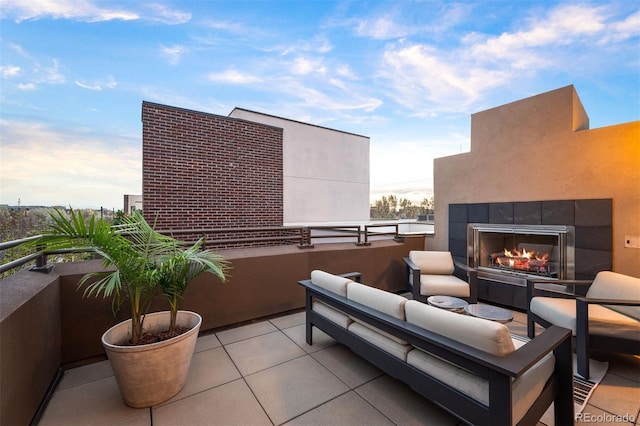8071 E 29th Ave, Denver, CO 80238 - view of patio with a balcony and an outdoor living space with a fireplace