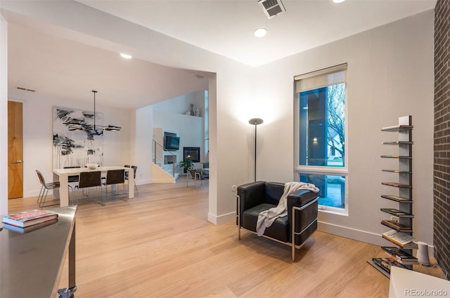 8071 E 29th Ave, Denver, CO 80238 - sitting room with light wood-style flooring, baseboards, and recessed lighting