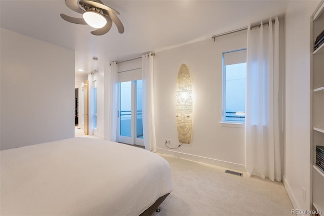 8071 E 29th Ave, Denver, CO 80238 - bedroom featuring carpet, a ceiling fan, and baseboards