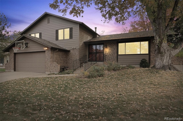 view of front of property with a garage