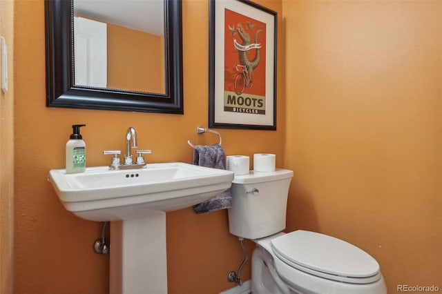 bathroom featuring toilet