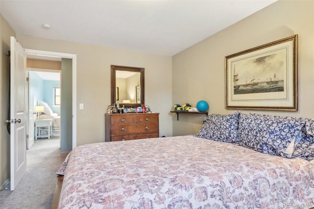 bedroom featuring carpet