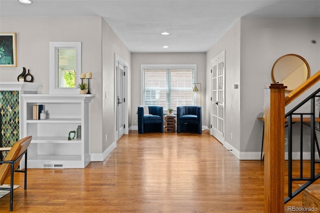 2485 S Fillmore St, Denver, CO 80210 - entrance foyer featuring wood finished floors, plenty of natural light, baseboards, and recessed lighting