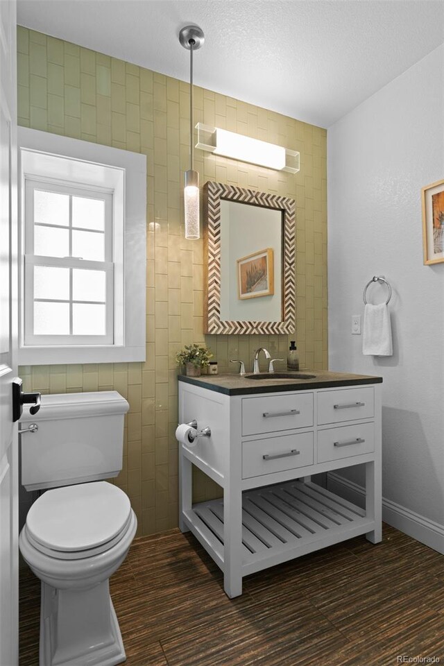 2485 S Fillmore St, Denver, CO 80210 - bathroom featuring vanity and toilet