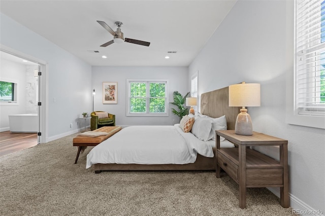 2485 S Fillmore St, Denver, CO 80210 - carpeted bedroom with baseboards, recessed lighting, connected bathroom, and a ceiling fan