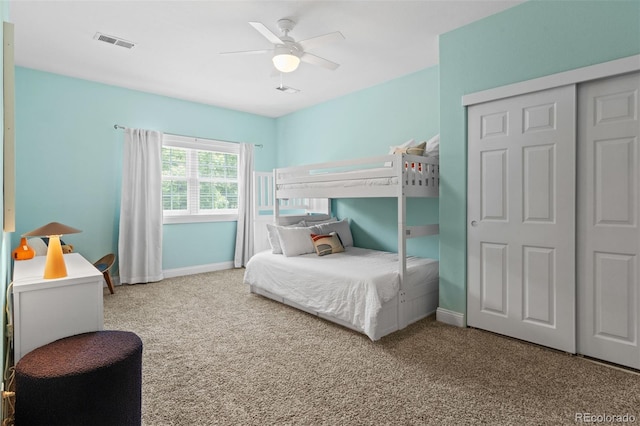 2485 S Fillmore St, Denver, CO 80210 - bedroom with carpet flooring, baseboards, ceiling fan, and a closet