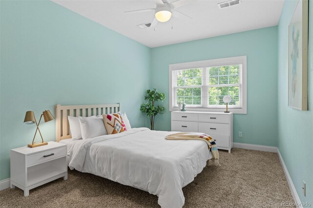 2485 S Fillmore St, Denver, CO 80210 - bedroom featuring light carpet, baseboards, and a ceiling fan