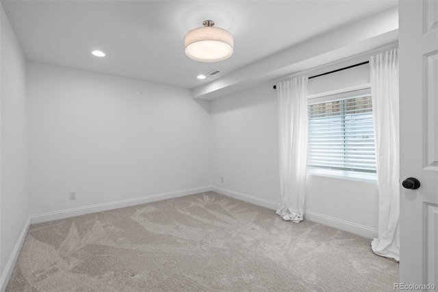 2485 S Fillmore St, Denver, CO 80210 - unfurnished room with light carpet, baseboards, and recessed lighting