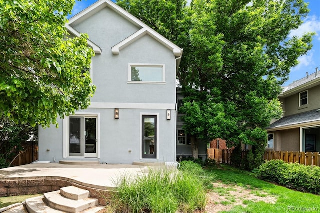 2485 S Fillmore St, Denver, CO 80210 - back of house with stucco siding and a patio