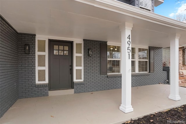 entrance to property with a porch