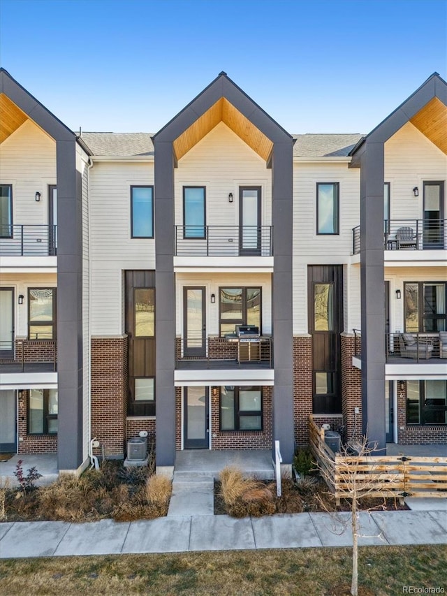 view of front of property featuring central AC unit