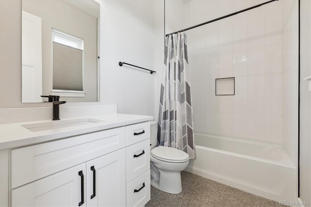 full bathroom featuring shower / bath combination with curtain, vanity, and toilet