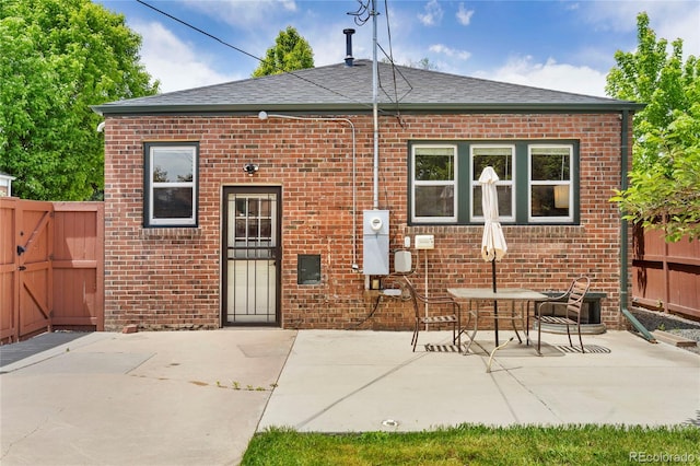 rear view of property featuring a patio