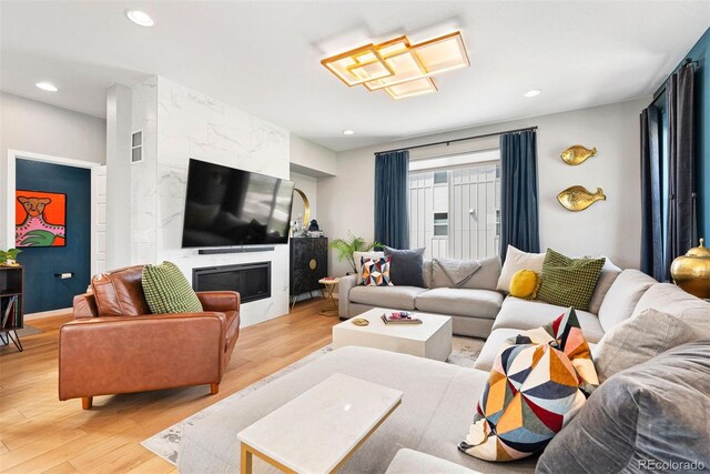 15020 Cast Pebble Cir, Parker, CO 80134 - living area with light wood finished floors and recessed lighting