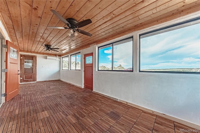 7727 County Road 521, Walsenburg, CO 81089 - unfurnished sunroom featuring wood ceiling, a wall mounted air conditioner, and ceiling fan