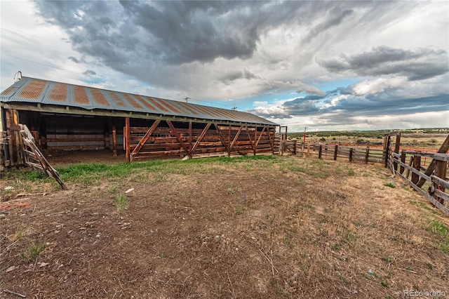 view of outdoor structure featuring a rural view